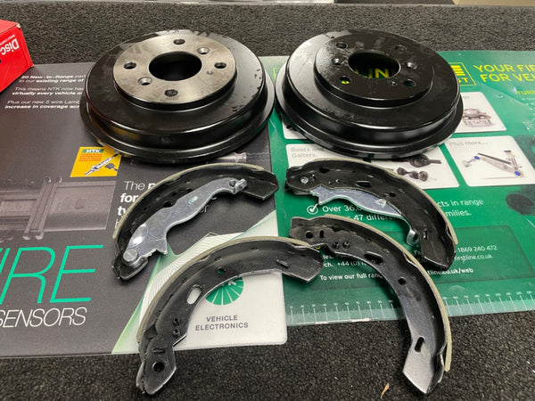 FOR FORD FEISTA MK7 REAR BRAKE DRUMS AND BRAKE SHOES