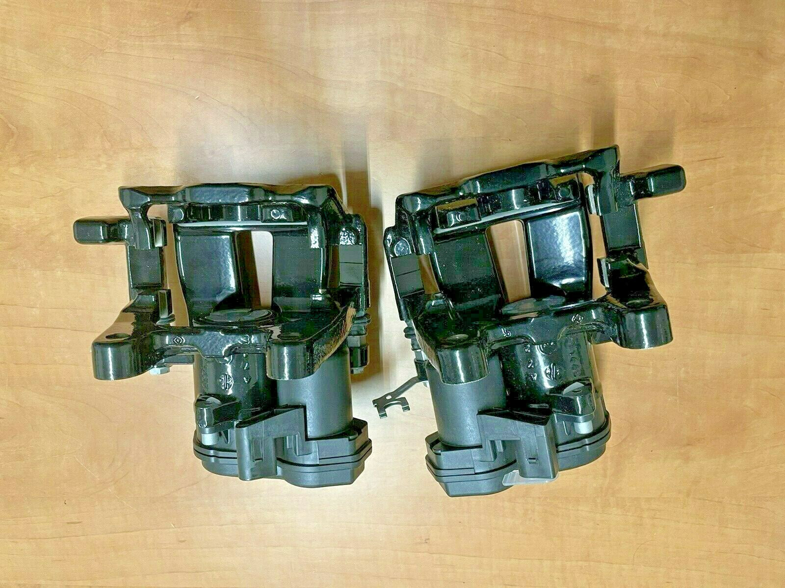 AUDI RSQ3 8U 2013-17 REAR ELECTRIC BRAKE CALIPER BRACKET PAIR NEW 310mm LH RH