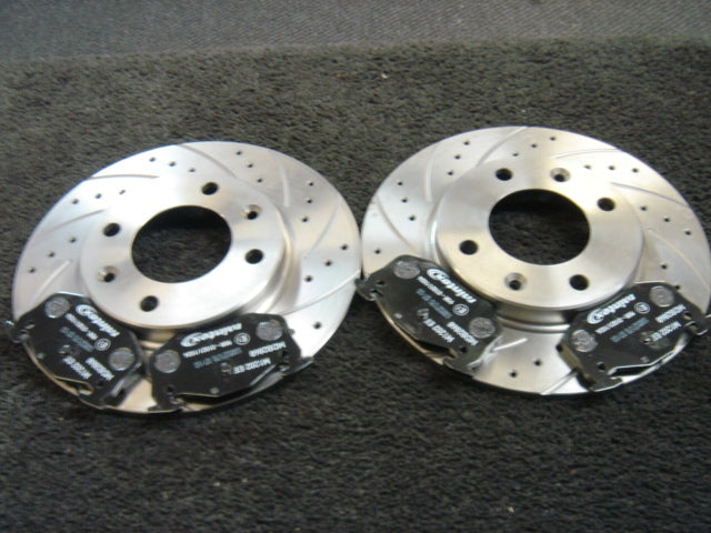 REAR CROSS DRILLED BRAKE DISCS PADS FOR PEUGEOT 205 1.9GTI CTi TD 