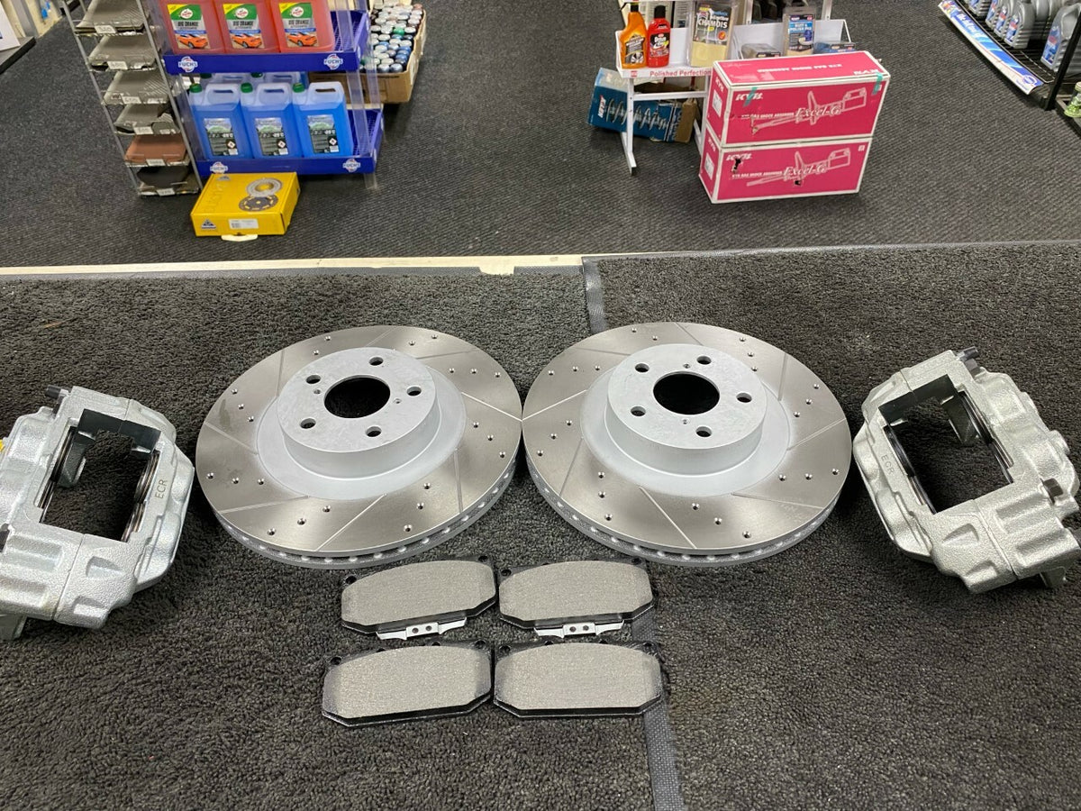 2 CROSS DRILLED GROOVED BRAKE DISC PAD 4POT BRAKE CALIPERS FOR IMPREZA WRX TURBO