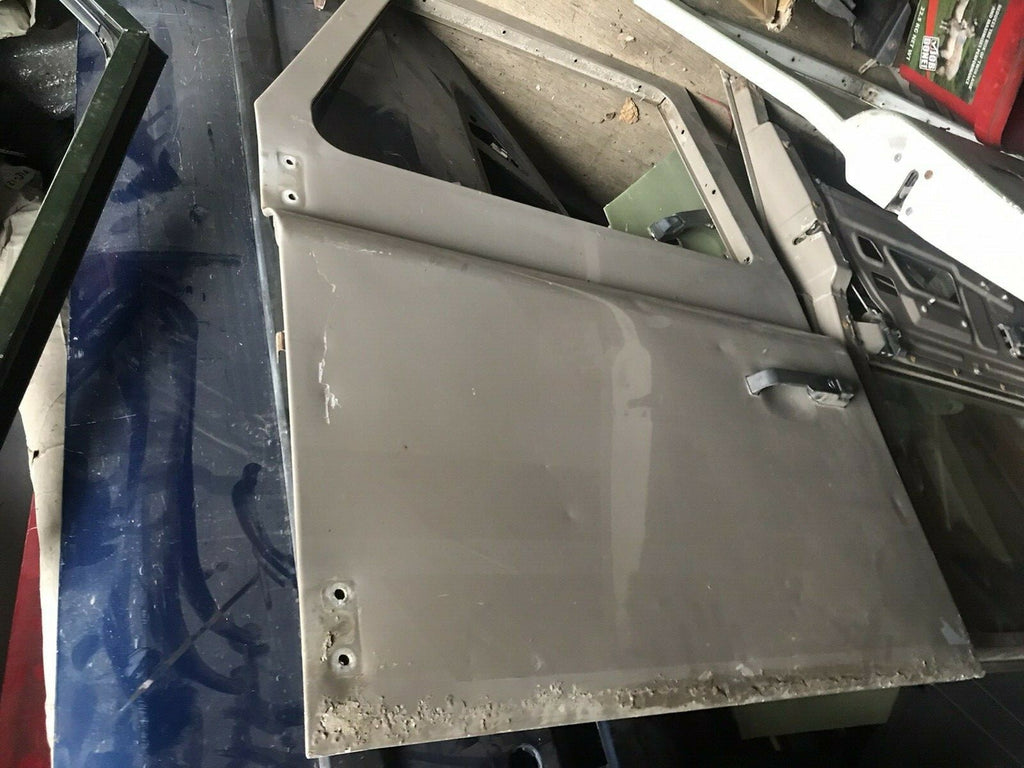 LAND ROVER DEFENDER 90 110 TDI  PASSENGER SIDE FRONT DOOR  USED NEEDS SKIN
