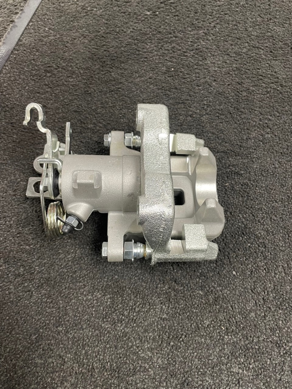 REAR BRAKE CALIPER + CARRIER COMPLETE VW CADDY MK3 TDi SDi 2K0615423C NS LH