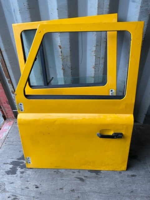 NS LH PASSENGER SIDE FRONT DOOR LAND ROVER DEFENDER 90 110 TDI CSW YELLOW
