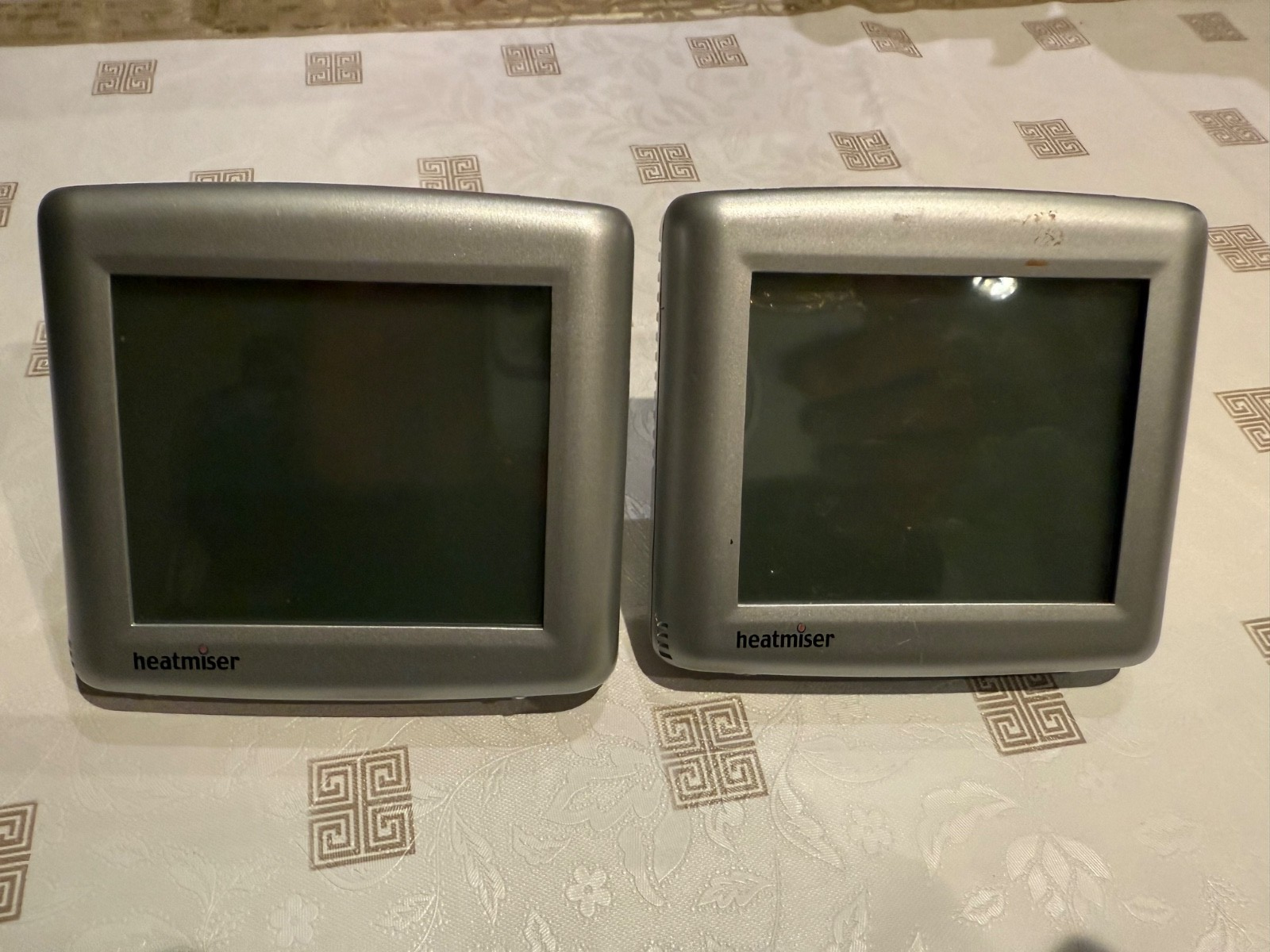 Pair of Silver Heatmiser programable room thermostat Model: PRT-TS  20 ip rating