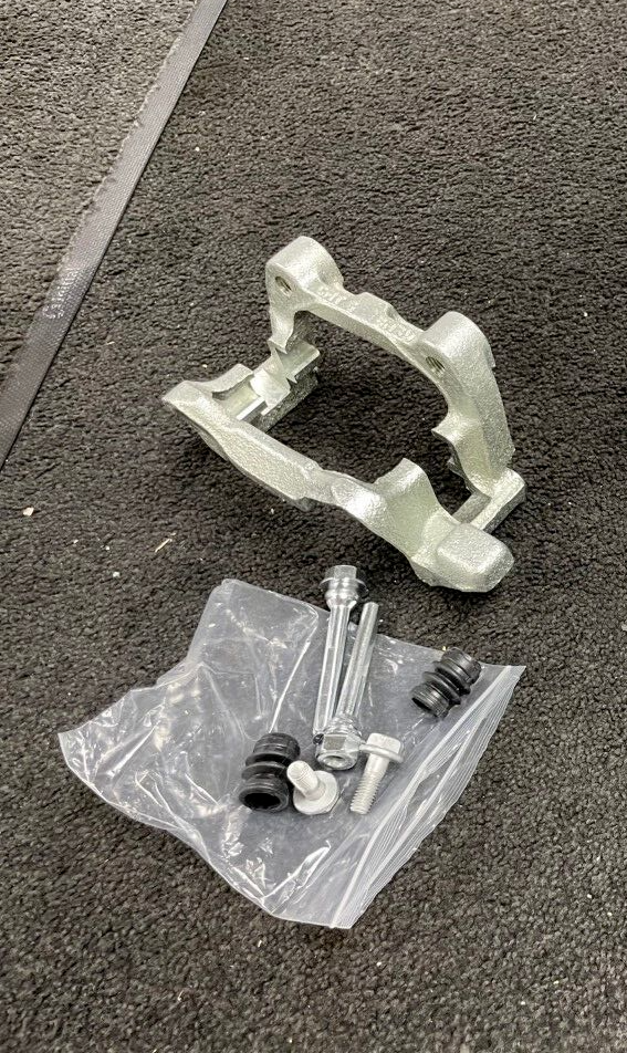 REAR BRAKE CALIPER CARRIER BRACKET LH NS AUDI A3 8P TFSi TSi TD GTD 256MM DISC