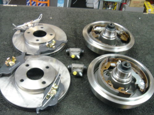 FOCUS 98-04 FRONT REAR BRAKE DISCS DRUMS SHOES BEARINGS
