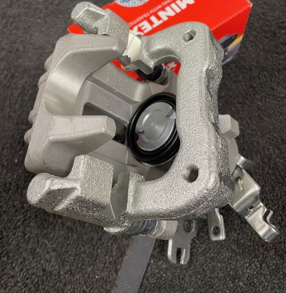 REAR BRAKE CALIPER + CARRIER COMPLETE VW CADDY MK3 TDi SDi 2K0615423C NS LH