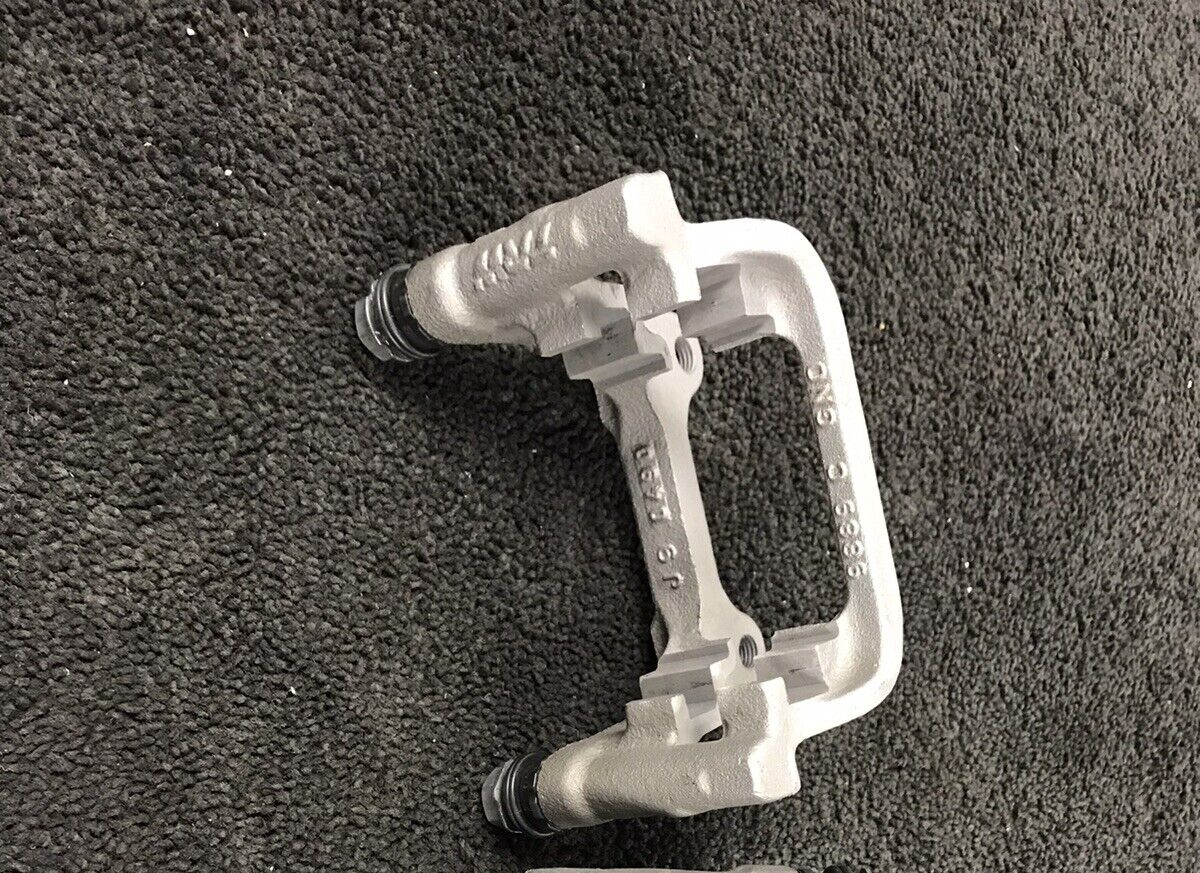 1 GENUINE VW REAR BRAKE CALIPER BRACKET CARRIER VW CADDY MK3 4 2.0TDI CUUD/DFSD