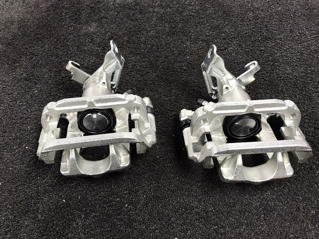 VAUXHALL ASTRA J 2009-2015 2 REAR BRAKE CALIPER COMPLETE BRACKETS SOLID DISC