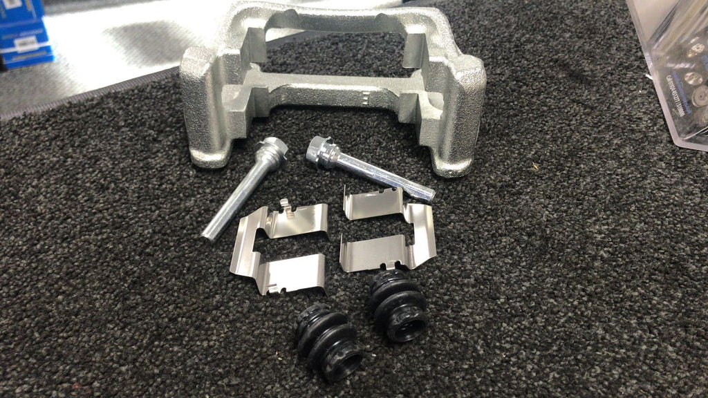 FOR VW T4 TRANSPORTER SHARAN REAR BRAKE CALIPER CARRIER BRACKET HANGER SUPPORT