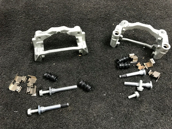 2 REAR BRAKE CALIPER CARRIER BRACKET KIT LH RH TRANSIT MK7 2.2 2.4TDCi 2006-13