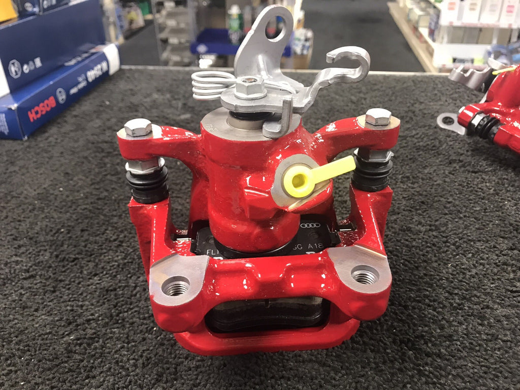 AUDI S1 QUATTRO REAR BRAKE CALIPER LH COMPLETE BRACKET PADS GENUINE OE RED