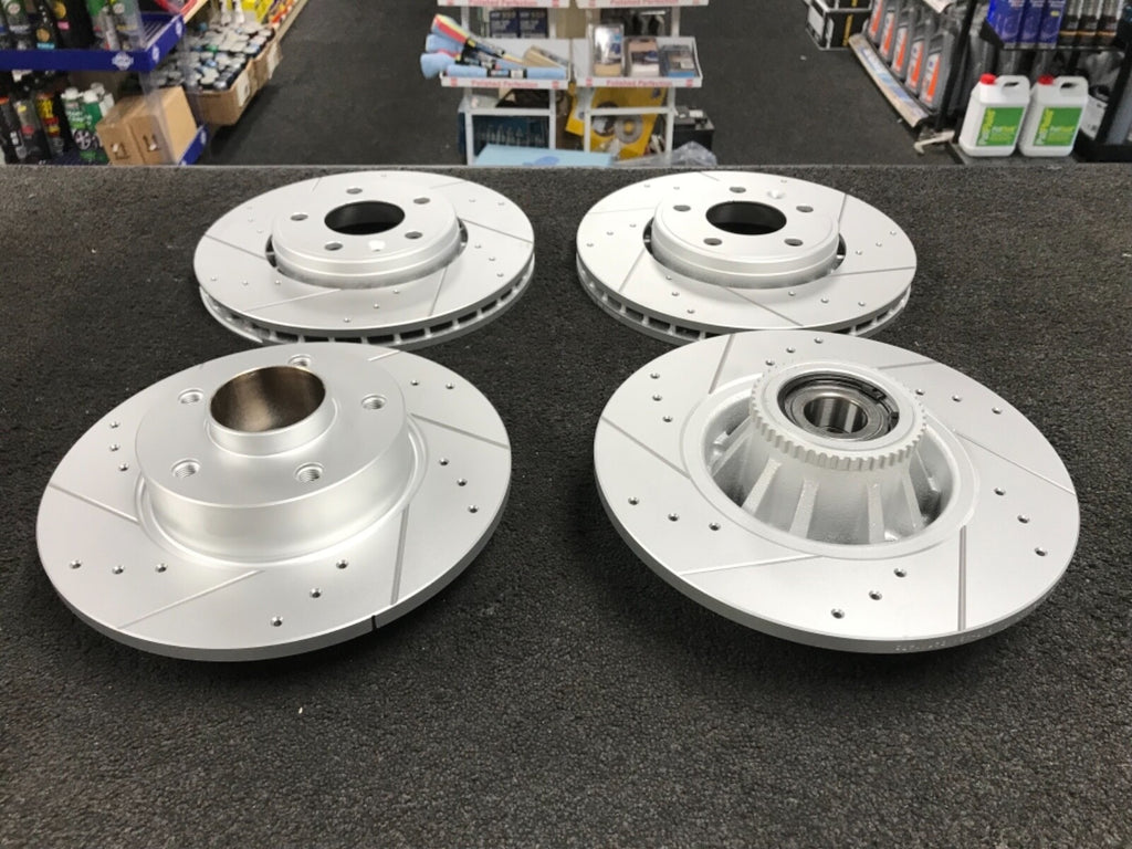 FOR VAUXHALL VIVARO TRAFIC BRAKE DISCS CROSS DRILLED GROOVED FRONT REAR