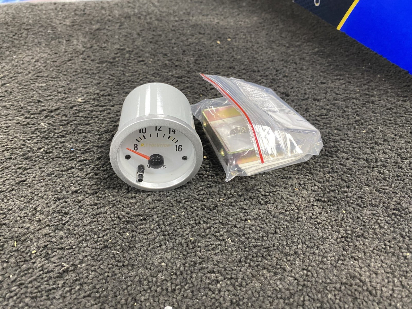 UNIVERSAL FIT R.EVOLUTION VOLT GAUGE 60X55 MM