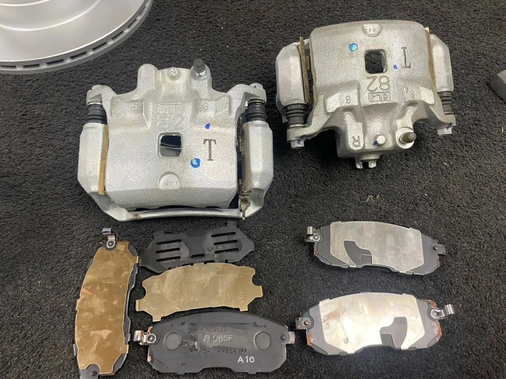 2 FRONT BRAKE CALIPERS COMPLETE BRACKETS FOR NISSAN JUKE F15 PULSAR 1.2 1.5DCi