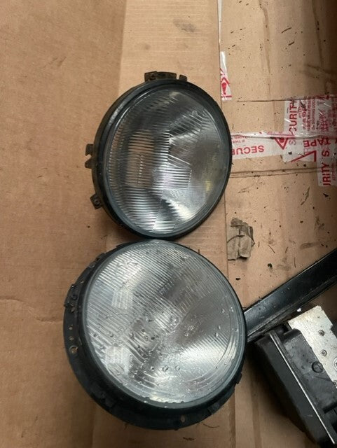 LAND ROVER DEFEDER 90 110 130 TD5 TDCi HEAD LIGHT AMPS PAIR GENUINE