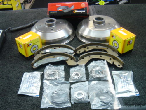 TIGRA 2 X REAR BRAKE DRUMS SHOES BEARING REAR SHOCKERS