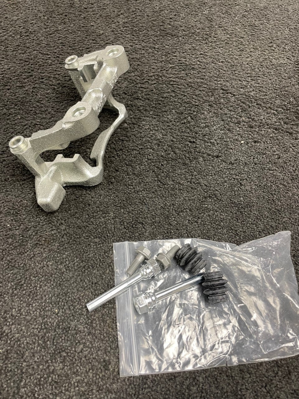 REAR BRAKE CALIPER CARRIER BRACKET LH NS AUDI A3 8P TFSi TSi TD GTD 256MM DISC