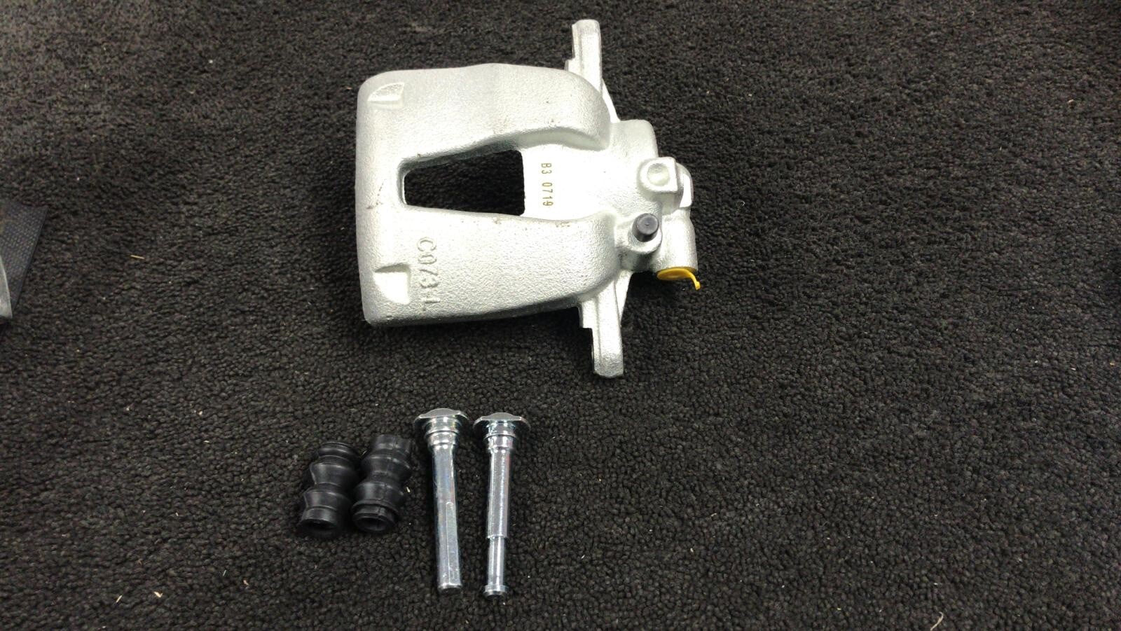 FRONT BRAKE CALIPER + SLIDER KIT NS LH PASSENGER VAUXHALL CORSA D ADAM ROCKS