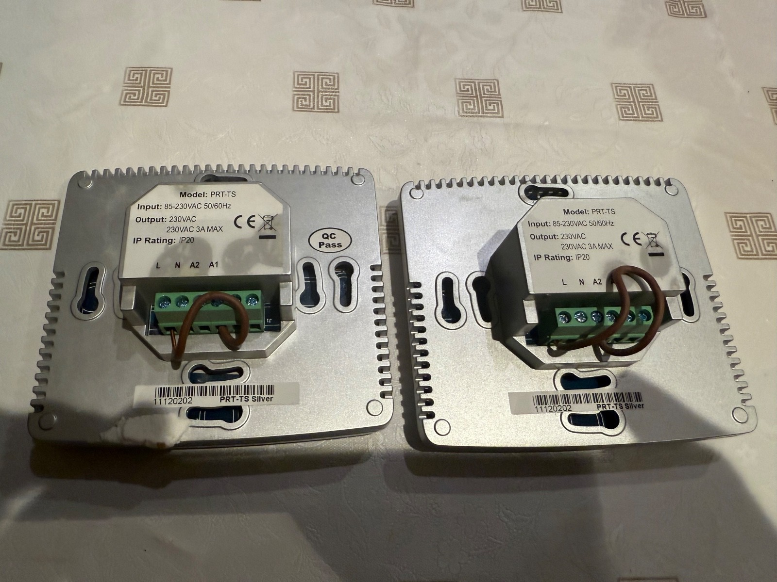 Pair of Silver Heatmiser programable room thermostat Model: PRT-TS  20 ip rating