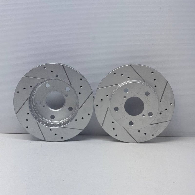FOR TOYOTA MR2 MK2  SW20 GT TURBO REV1 DRILLED GROOVED FRONT BRAKE DISCS 258MM